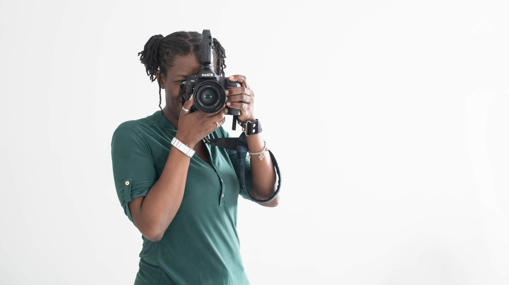 Korena Darnelle holding a camera for a self-portrait