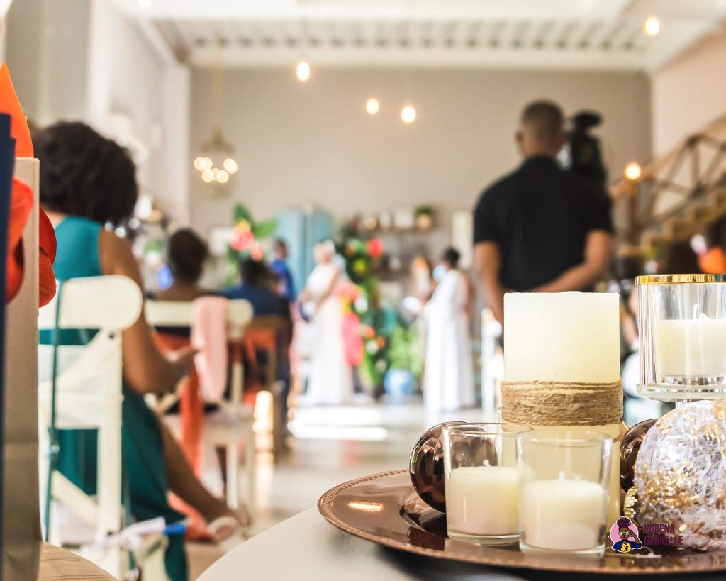 wedding scene with candles in the foreground